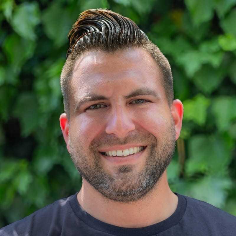 Portrait of Morgan, a professional stylist at hair, showcasing their expertise and style.