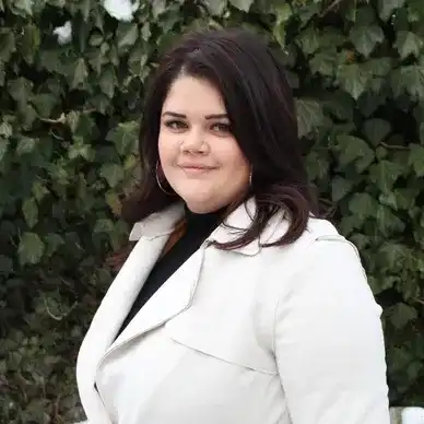 Portrait of Phoebe, a professional stylist at hair, showcasing their expertise and style.