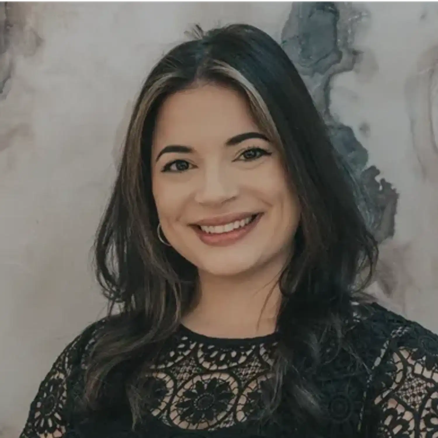 Portrait of Corey, a professional stylist at hair, showcasing their expertise and style.