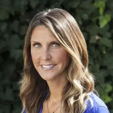 Portrait of Deann, a professional stylist at hair, showcasing their expertise and style.