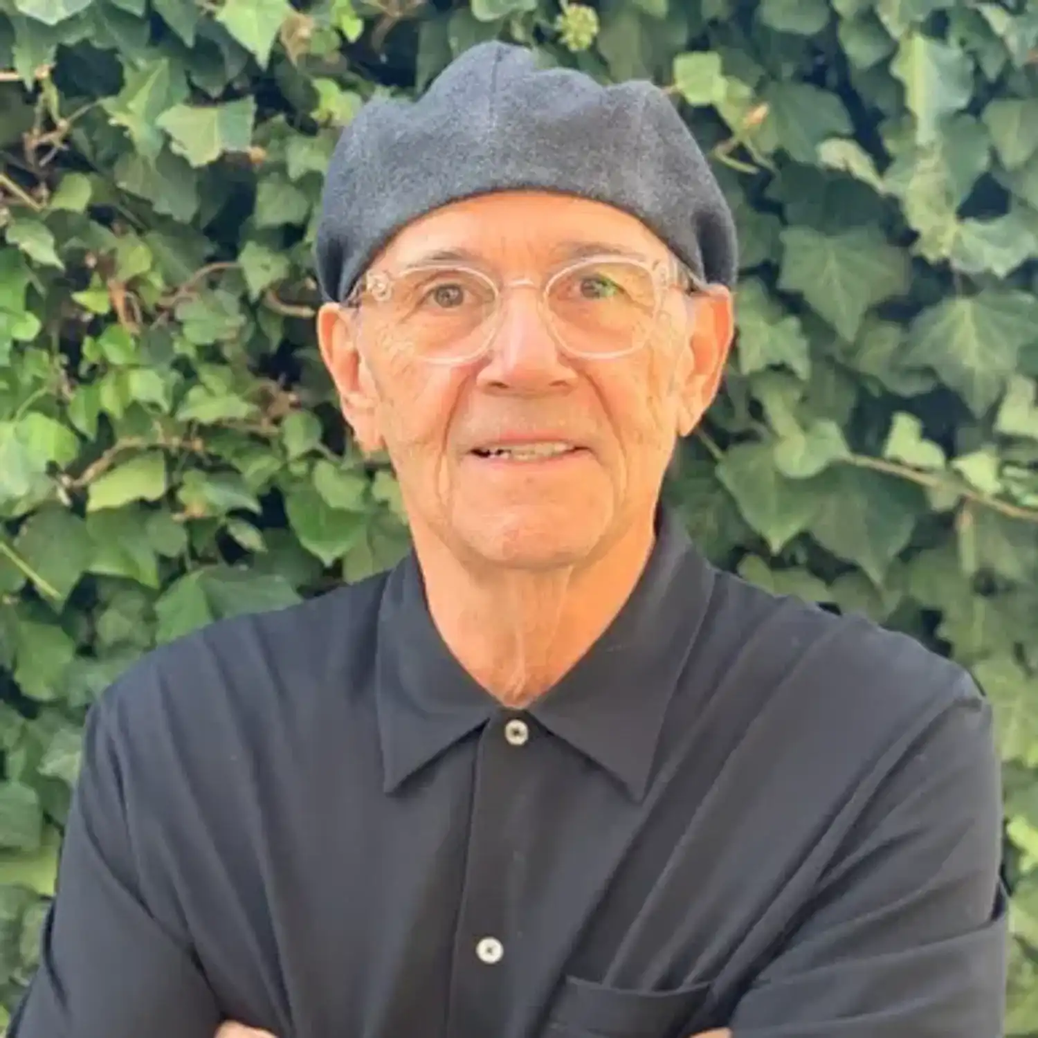 Portrait of Charles, a professional stylist at hair, showcasing their expertise and style.