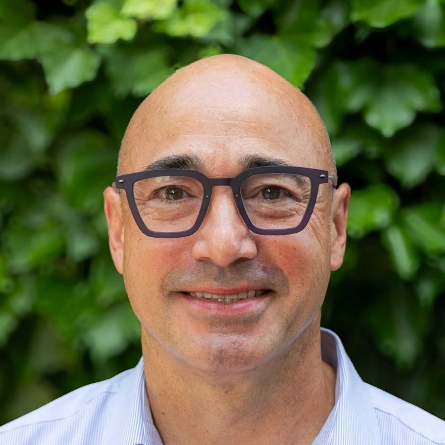 Portrait of William, a professional stylist at hair, showcasing their expertise and style.