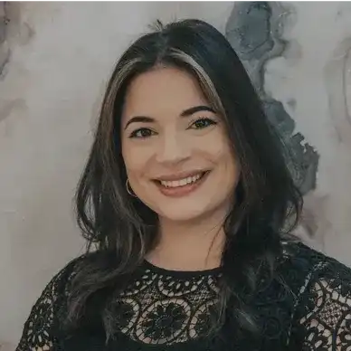 Portrait of Corey, a professional stylist at hair, showcasing their expertise and style.